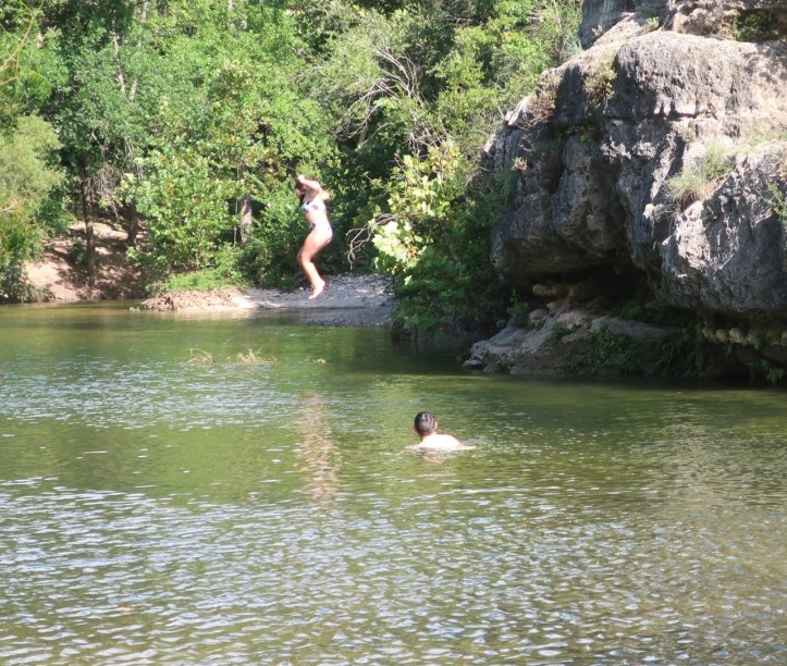 Payton jumping into Barton Springs 08.08.21