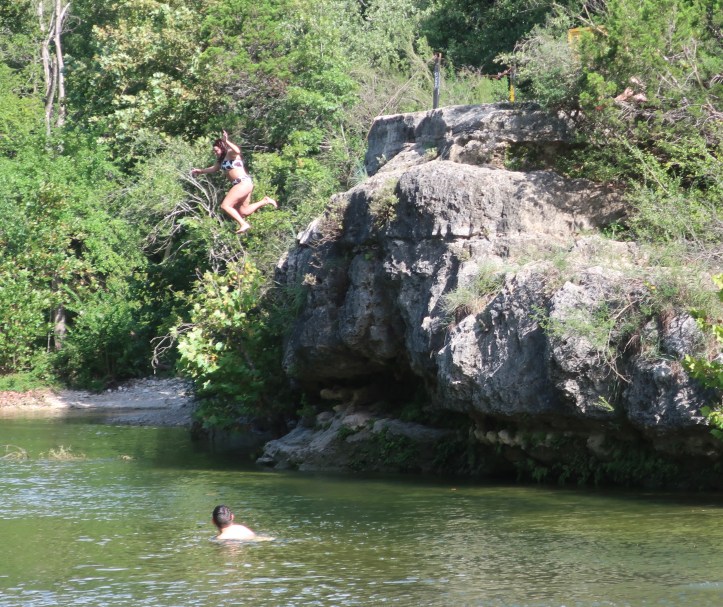Payton jumping into Barton Springs 08.08.21