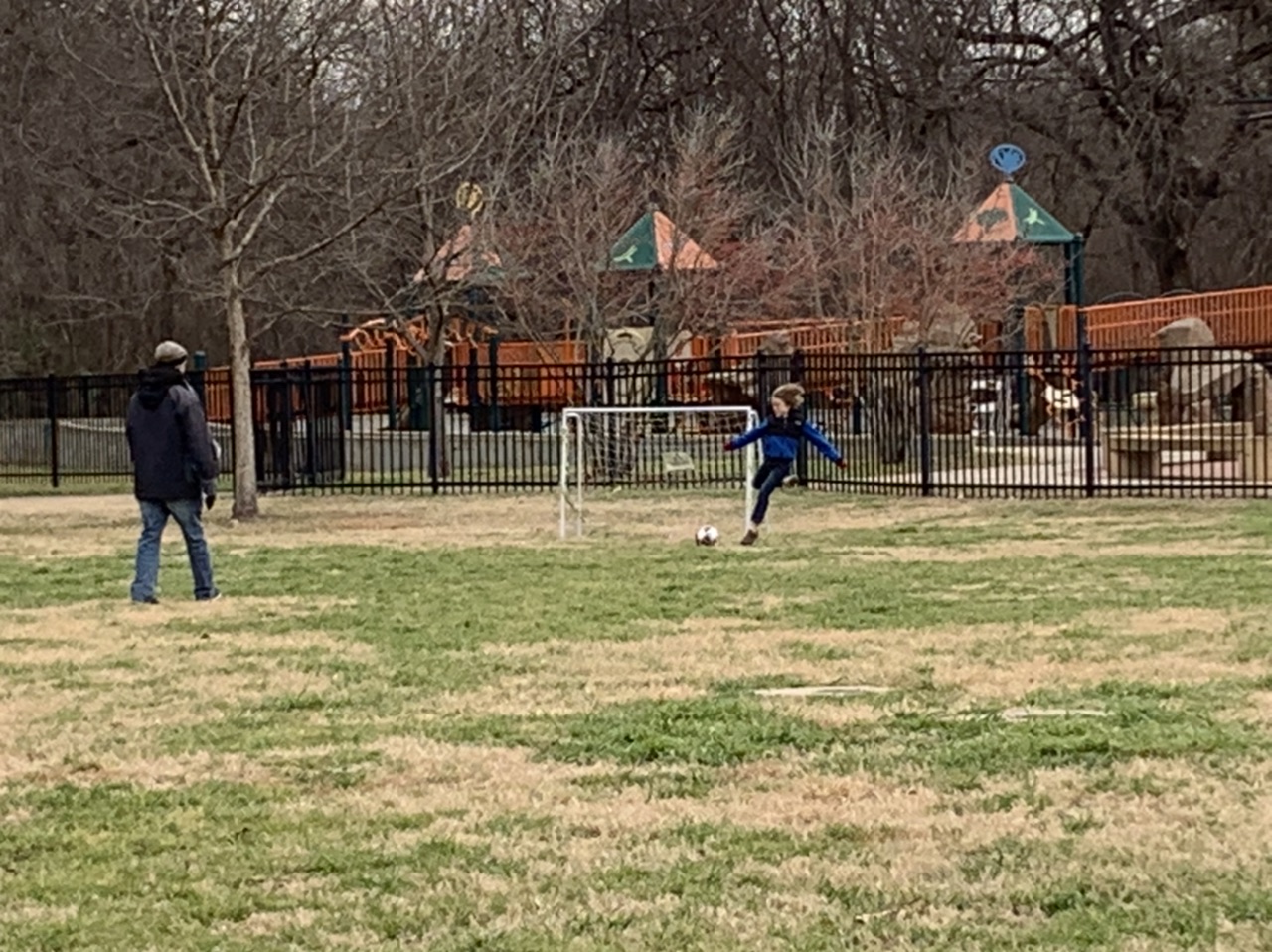 Max and his dad playing soccer at the park Feb 2022 ©Felipe Adan Lerma