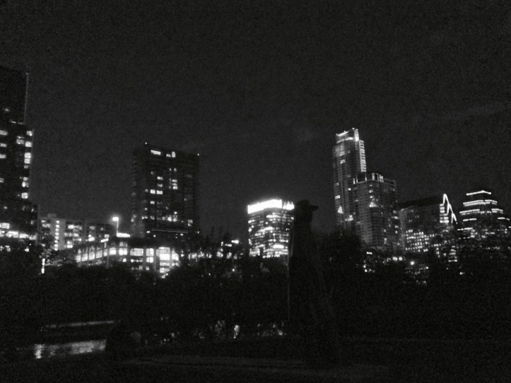 SRV Statue BW With Austin Skyline 2017 ©Felipe Adan Lerma https://felipeadan-lerma.pixels.com/featured/austin-hike-and-bike-trail-srv-gritty-austin-night-panorama-felipe-adan-lerma.html